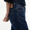 Blugi bootcut cu talie medie și material elastic Blugi bootcut cu talie medie și material elastic