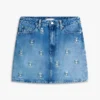 Fustă mini din denim cu talie înaltă și emblemă pe toată suprafața Fustă mini din denim cu talie înaltă și emblemă pe toată suprafața