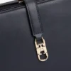 Geantă de umăr cu monogramă lustruită Geantă de umăr cu monogramă lustruită