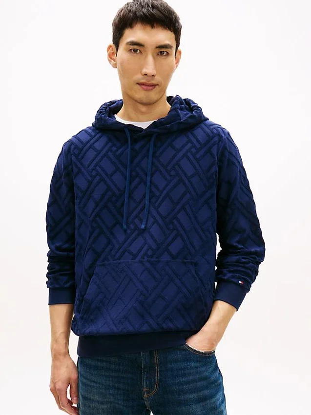 Hanorac cu glugă din velur jacquard cu logo cu steaguri pe toată suprafața Hanorac cu glugă din velur jacquard cu logo cu steaguri pe toată suprafața