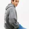 Hanorac cu glugă Tommy Jeans cu logo vopsit cu spray