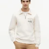 Hanorac polo cu logo floral și fermoar pe un sfert Hanorac polo cu logo floral și fermoar pe un sfert