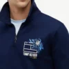 Hanorac polo cu logo floral și fermoar pe un sfert Hanorac polo cu logo floral și fermoar pe un sfert