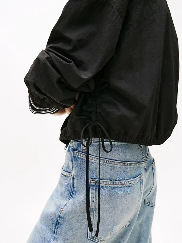 Jachetă Tommy Jeans impermeabilă cu fermoar Jachetă Tommy Jeans impermeabilă cu fermoar