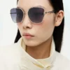 Ochelari de soare cu ramă metalică în formă de fluture Ochelari de soare cu ramă metalică în formă de fluture