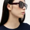 Ochelari de soare cu ramă în formă de fluture Ochelari de soare cu ramă în formă de fluture