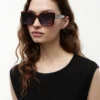 Ochelari de soare cu ramă în formă de fluture Ochelari de soare cu ramă în formă de fluture