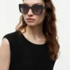 Ochelari de soare cu ramă în formă de fluture Ochelari de soare cu ramă în formă de fluture