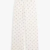 Pantaloni de dormit din jersey cu imprimeu floral Pantaloni de dormit din jersey cu imprimeu floral