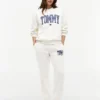 Pantaloni de trening cu logo Tommy în stil universitar Pantaloni de trening cu logo Tommy în stil universitar