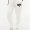 Pantaloni de trening cu logo Tommy în stil universitar Pantaloni de trening cu logo Tommy în stil universitar