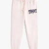 Pantaloni de trening cu logo Tommy în stil universitar Pantaloni de trening cu logo Tommy în stil universitar