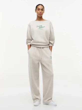 Pantaloni de trening din material froté cu logo script relaxat Pantaloni de trening din material froté cu logo script relaxat