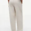 Pantaloni de trening din material froté cu logo script relaxat Pantaloni de trening din material froté cu logo script relaxat