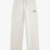 Pantaloni de trening din material froté cu logo script relaxat Pantaloni de trening din material froté cu logo script relaxat