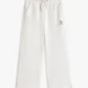 Pantaloni de trening pentru copii cu logo stea din strasuri Pantaloni de trening pentru copii cu logo stea din strasuri