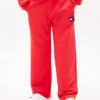 Pantaloni de trening pentru copii cu logo steag ondulat Pantaloni de trening pentru copii cu logo steag ondulat