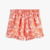 Pantaloni scurți cu volane și imprimeu tropical pentru copii Pantaloni scurți cu volane și imprimeu tropical pentru copii