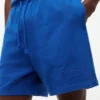 Pantaloni scurți de plajă vopsiți în întregime Tommy Jeans Pantaloni scurți de plajă vopsiți în întregime Tommy Jeans