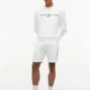 Pantaloni scurți din fleece cu logo Tommy brodat Pantaloni scurți din fleece cu logo Tommy brodat