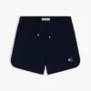 Pantaloni scurți pentru copii cu logo steag în nuanțe tonale Pantaloni scurți pentru copii cu logo steag în nuanțe tonale