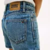 Pantaloni scurți skinny din denim pentru copii Pantaloni scurți skinny din denim pentru copii