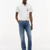 Polo cu logo-ul Tommy x Cadillac F1® Team Polo cu logo-ul Tommy x Cadillac F1® Team