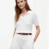 Polo cu mâneci scurte, tricotat cu model în relief Polo cu mâneci scurte, tricotat cu model în relief