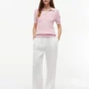 Polo cu mâneci scurte, tricotat cu model în relief Polo cu mâneci scurte, tricotat cu model în relief