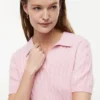 Polo cu mâneci scurte, tricotat cu model în relief Polo cu mâneci scurte, tricotat cu model în relief