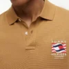 Polo din bumbac neted cu steag ondulat, croială regular