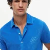 Polo din material frotir cu monogramă script