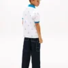 Polo elastic pentru copii cu logo nautic pe toată suprafața Polo elastic pentru copii cu logo nautic pe toată suprafața