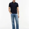 Polo Tommy cu croială regular și material elastic