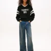Pulover Tommy Jeans 85 Varsity cu guler în V Pulover Tommy Jeans 85 Varsity cu guler în V