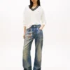 Pulover Tommy Jeans cu croială lejeră și guler în V Pulover Tommy Jeans cu croială lejeră și guler în V