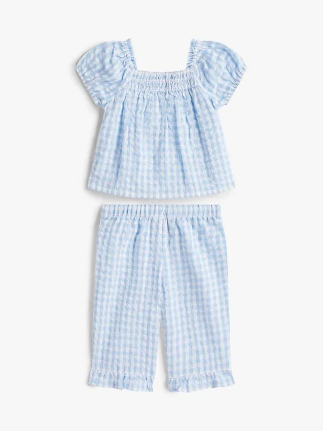 Set de bluză și pantaloni în carouri pentru bebeluși Set de bluză și pantaloni în carouri pentru bebeluși