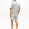 Set de pijamale cu cămașă cu mâneci scurte și pantaloni scurți Set de pijamale cu cămașă cu mâneci scurte și pantaloni scurți