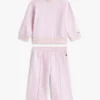 Set pentru bebeluși cu bluză cu stele și pantaloni cu croi larg Set pentru bebeluși cu bluză cu stele și pantaloni cu croi larg