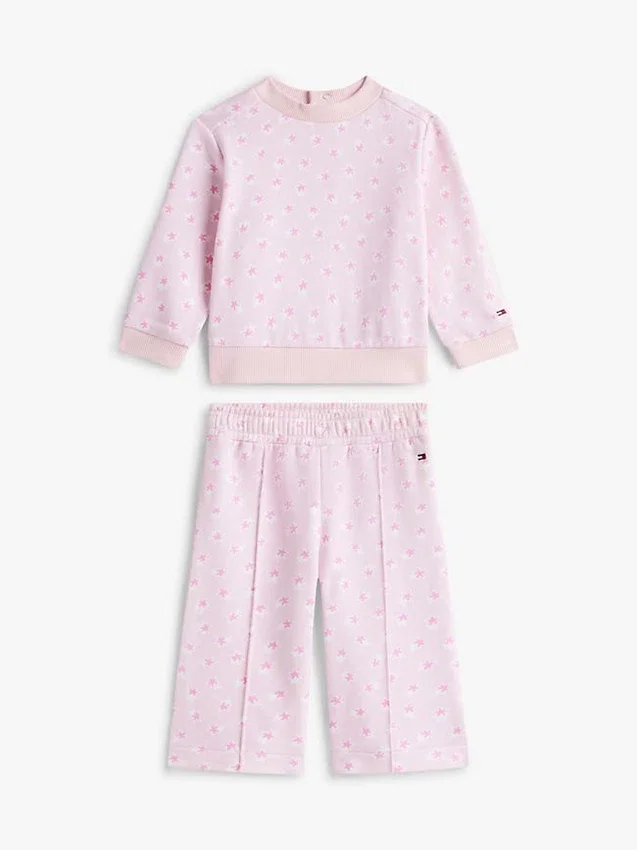 Set pentru bebeluși cu bluză cu stele și pantaloni cu croi larg Set pentru bebeluși cu bluză cu stele și pantaloni cu croi larg