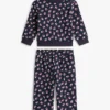 Set pentru bebeluși cu bluză cu stele și pantaloni cu croi larg Set pentru bebeluși cu bluză cu stele și pantaloni cu croi larg