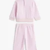 Set pentru bebeluși cu bluză cu stele și pantaloni cu croi larg Set pentru bebeluși cu bluză cu stele și pantaloni cu croi larg