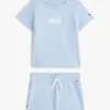 Set tricou și pantaloni scurți cu logo steag pentru bebeluși Set tricou și pantaloni scurți cu logo steag pentru bebeluși