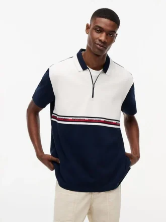 Tommy Jeans Polo relaxat cu fermoar pe un sfert Tommy Jeans Polo relaxat cu fermoar pe un sfert