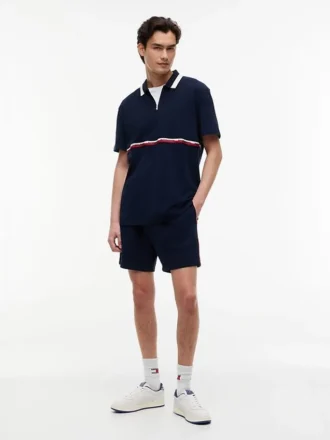 Tommy Jeans Polo relaxat cu fermoar pe un sfert