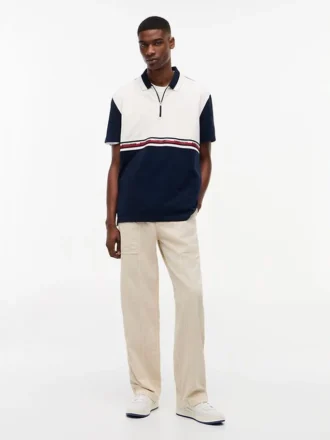 Tommy Jeans Polo relaxat cu fermoar pe un sfert Tommy Jeans Polo relaxat cu fermoar pe un sfert