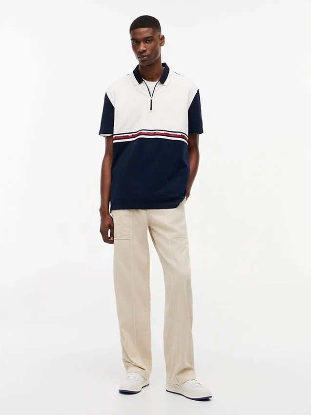 Tommy Jeans Polo relaxat cu fermoar pe un sfert Tommy Jeans Polo relaxat cu fermoar pe un sfert
