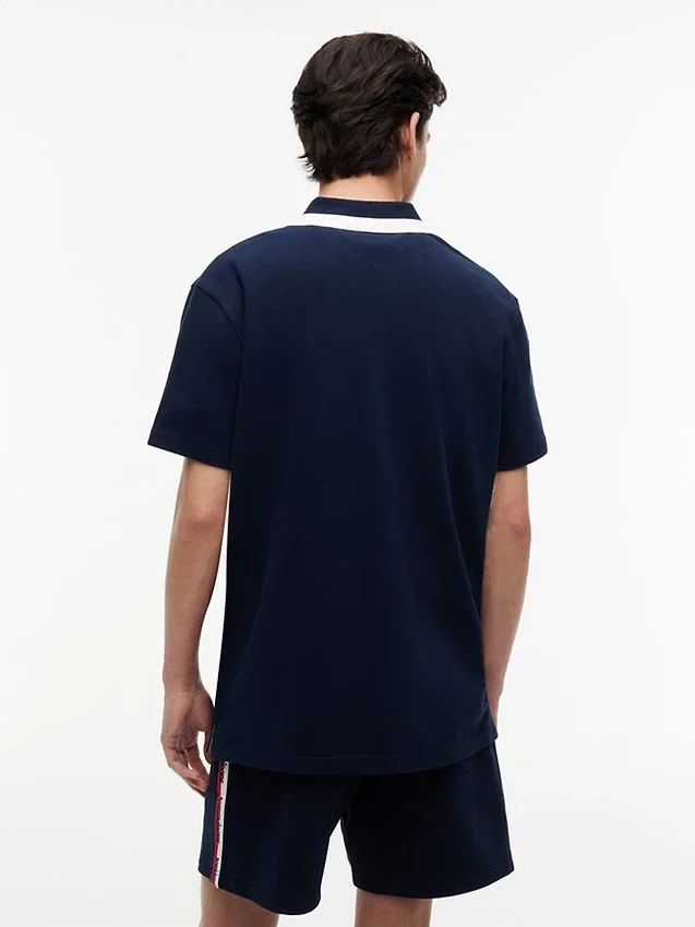 Tommy Jeans Polo relaxat cu fermoar pe un sfert Tommy Jeans Polo relaxat cu fermoar pe un sfert