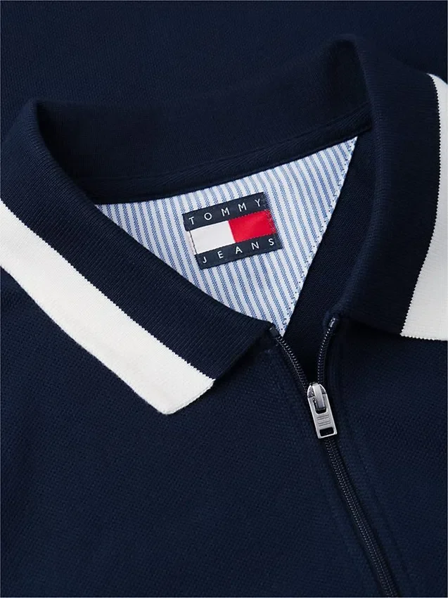 Tommy Jeans Polo relaxat cu fermoar pe un sfert Tommy Jeans Polo relaxat cu fermoar pe un sfert
