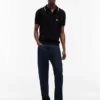 Tommy Jeans Pulover polo cu mâneci scurte la pantaloni scurți Tommy Jeans Pulover polo cu mâneci scurte la pantaloni scurți